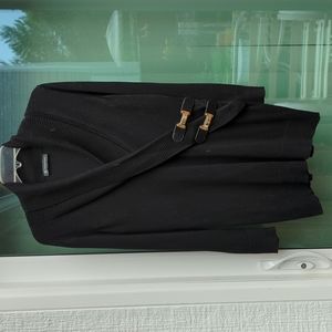 Black cowl neck sweater with gold buckles